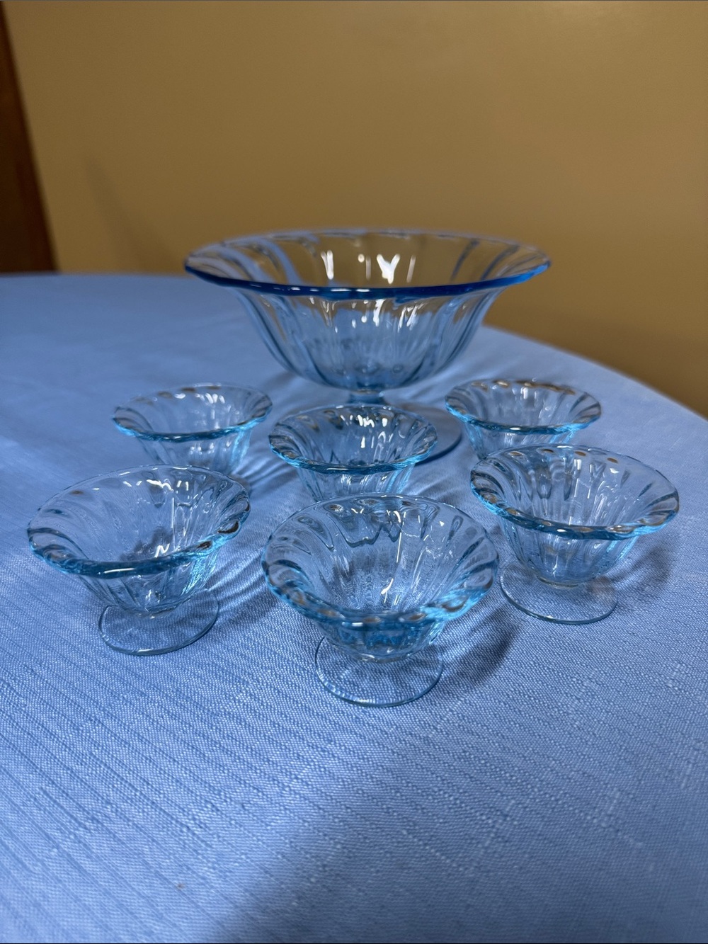Fostoria blue glass mustard bowl and 6 salt dips